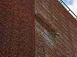 facciata ventilata rivestita con pannelli forati in acciaio corten